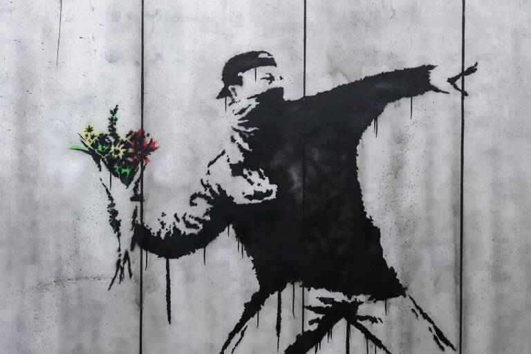 Banksy: Ausschnitt aus einem Grafitto